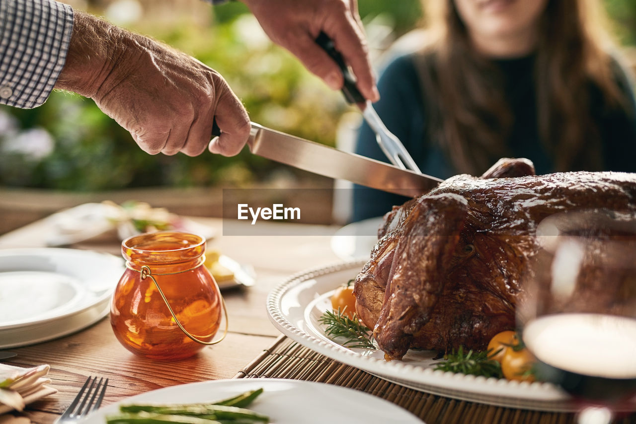 midsection of woman preparing food in restaurant