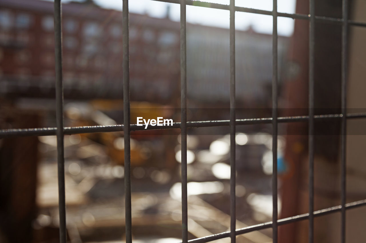 Behind the fence to a construction site in umea