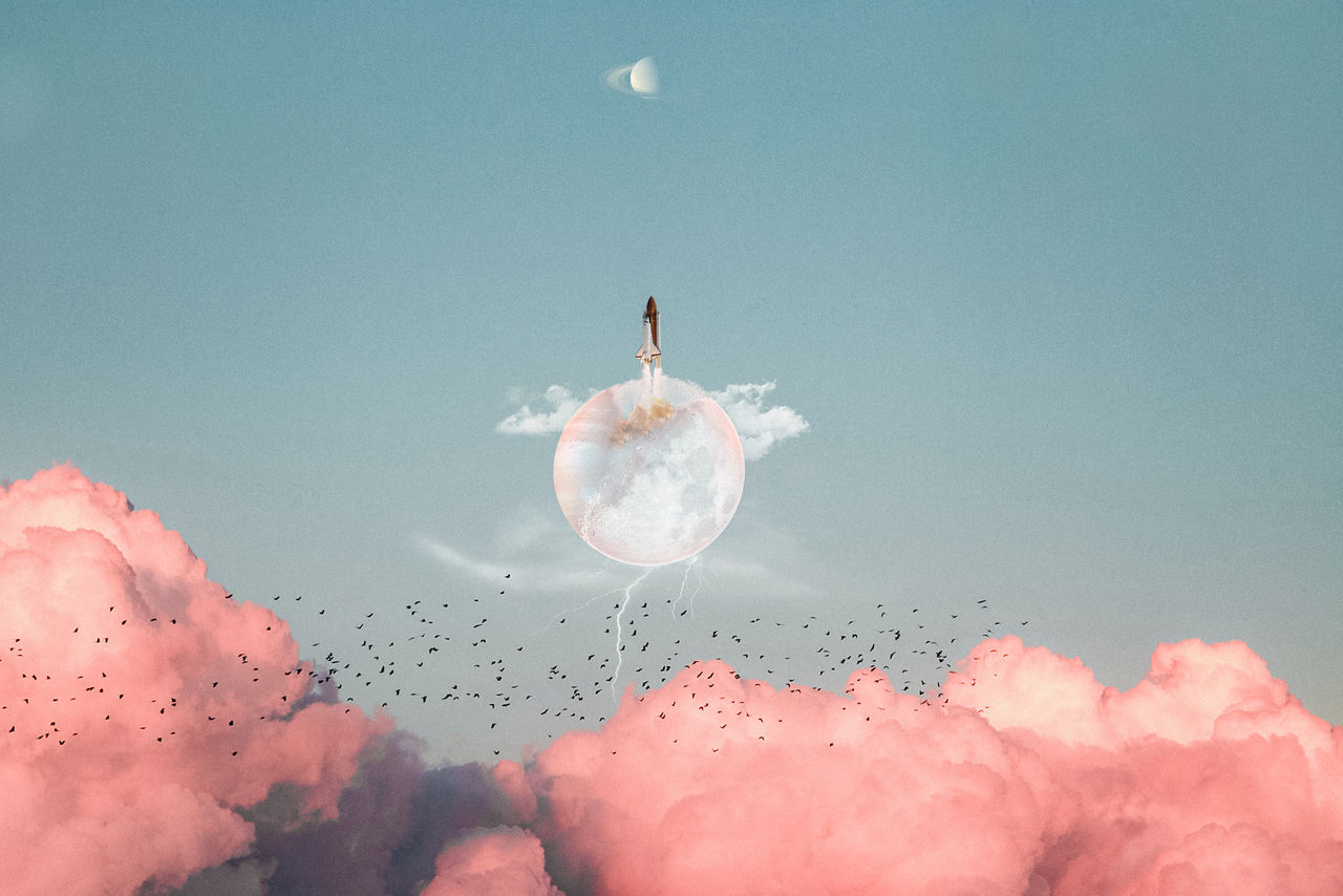 Digital composite image of rocket flying against sky