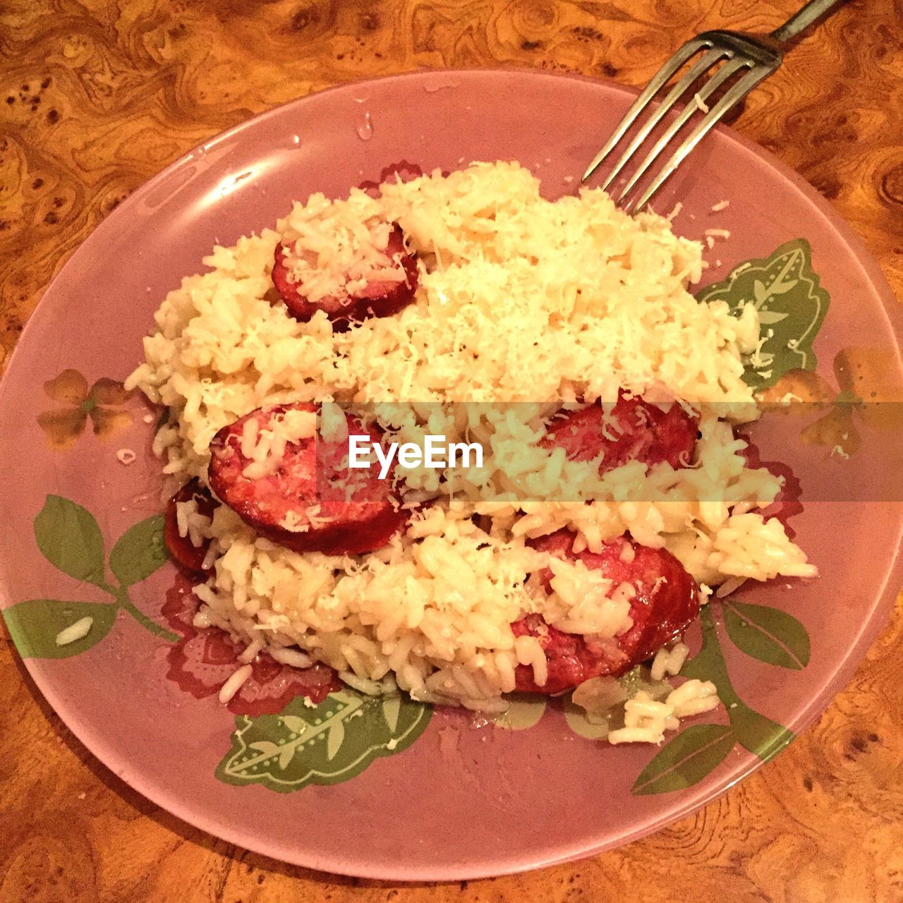 Close-up of served meat slices with rice in plate