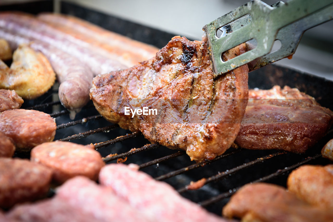 Close-up of meat on barbecue grill