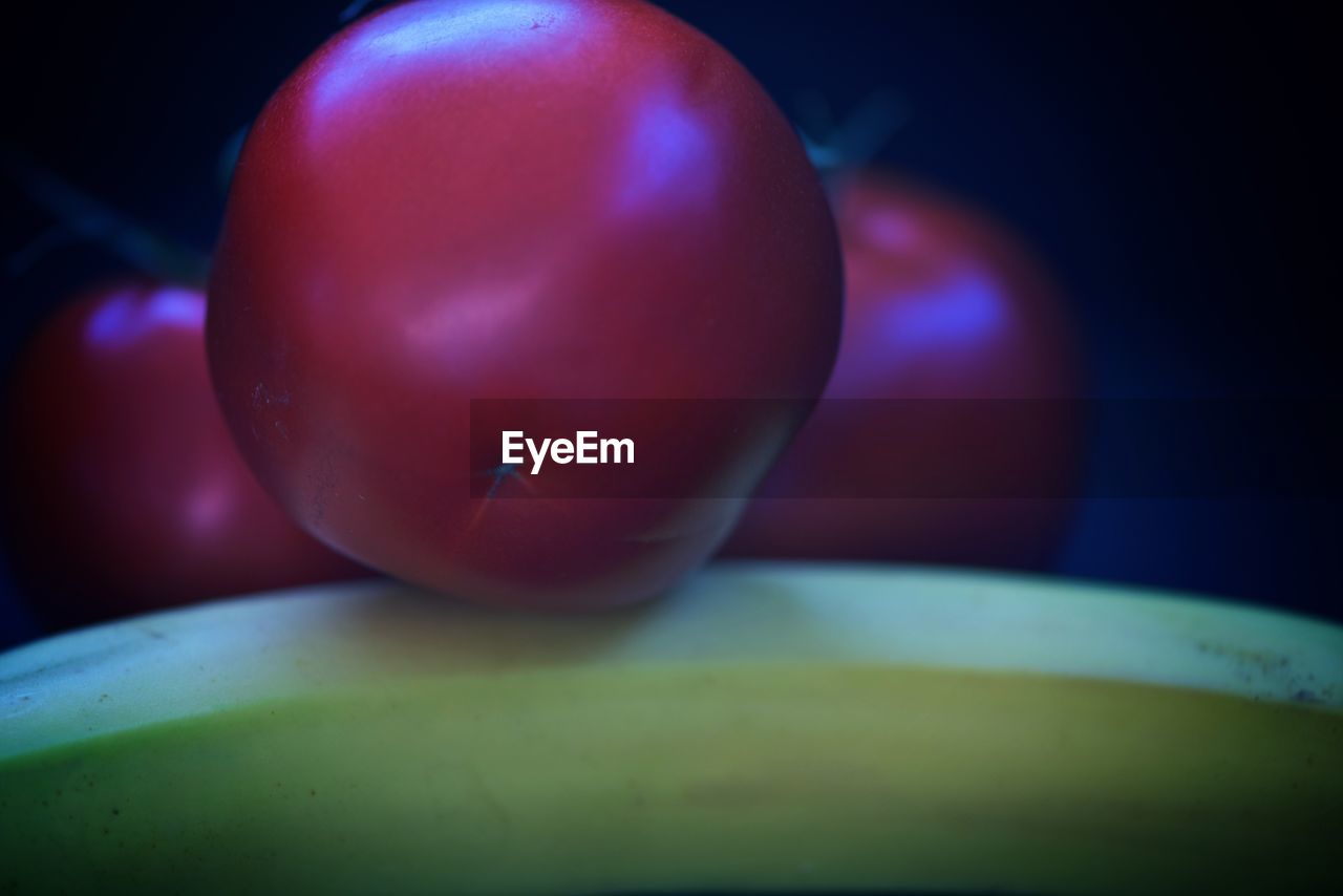 Close-up of plum and banana