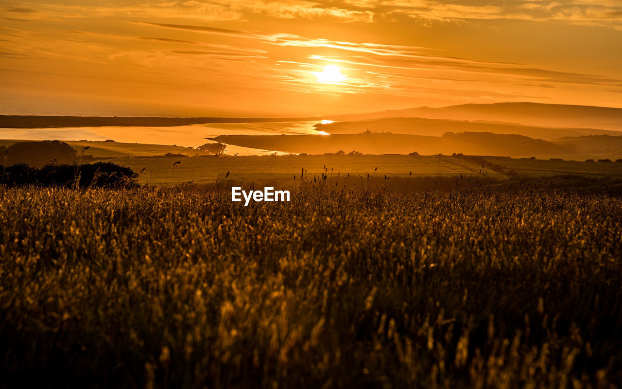 Sunset at sea barn farm, fleet, weymouth, uk