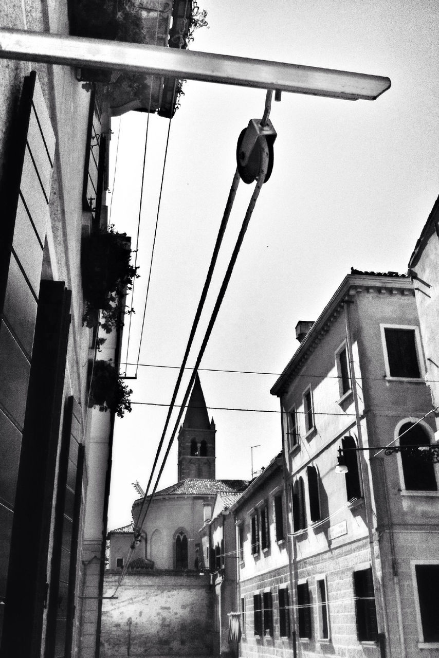 LOW ANGLE VIEW OF BUILDINGS AGAINST SKY