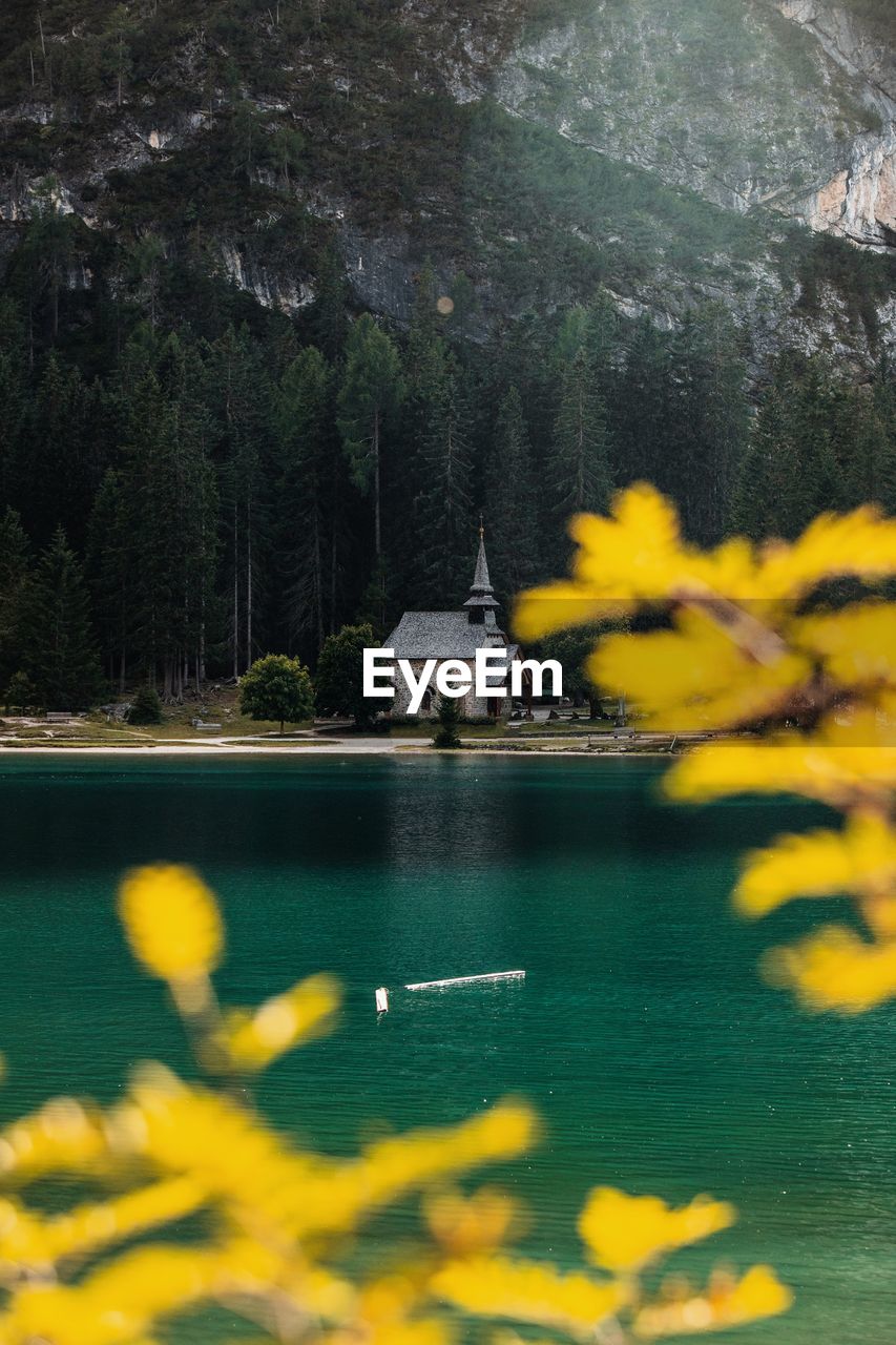 Scenic view of lake against cloudy sky