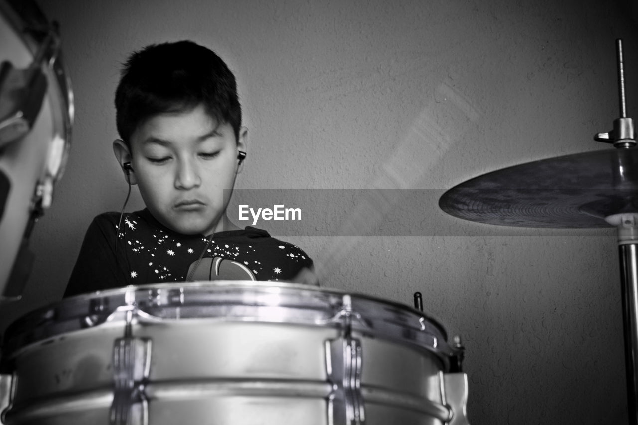 Arts Culture And Entertainment Childhood Drum - Percussion Instrument Drum Kit Drummer Headshot Music Musical Instrument Musician One Person People Playing Sitting Analogue Sound