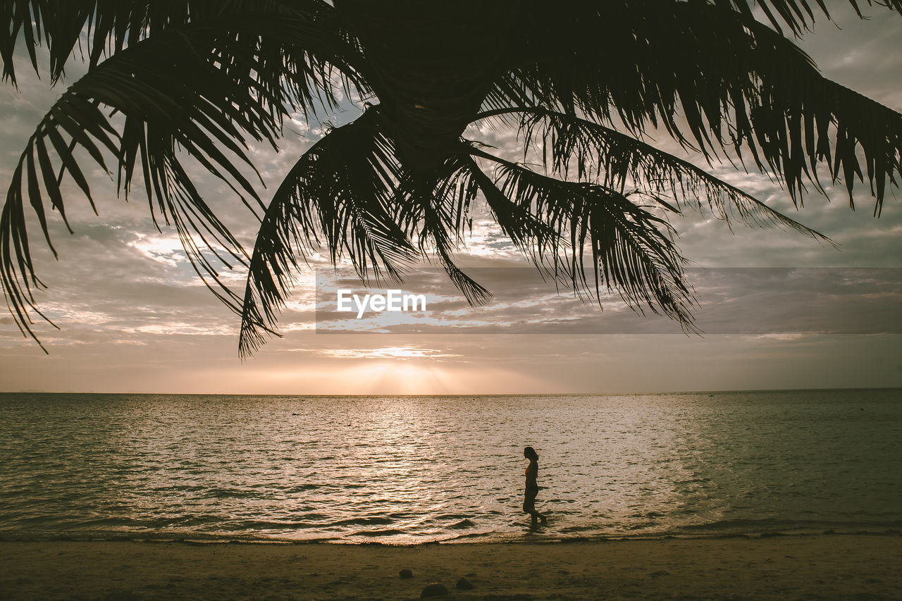 Scenic view of sea against sky at sunset