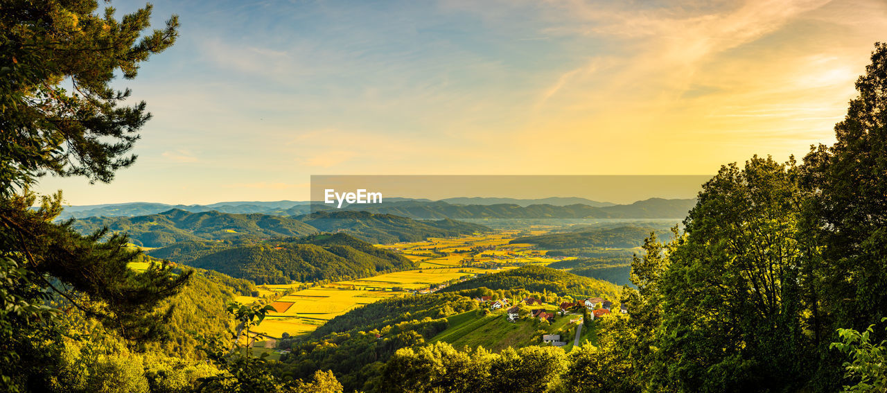 Scenic view of landscape against sky during sunset