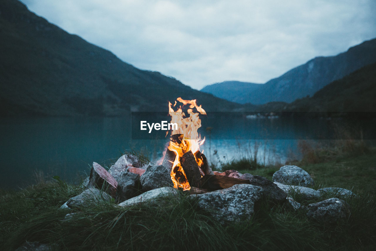 A bonfire we made while camping somewhere close to an idylic lake in norway. 