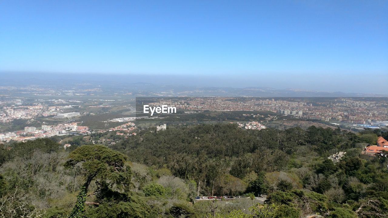 AERIAL VIEW OF RESIDENTIAL DISTRICT AGAINST SKY