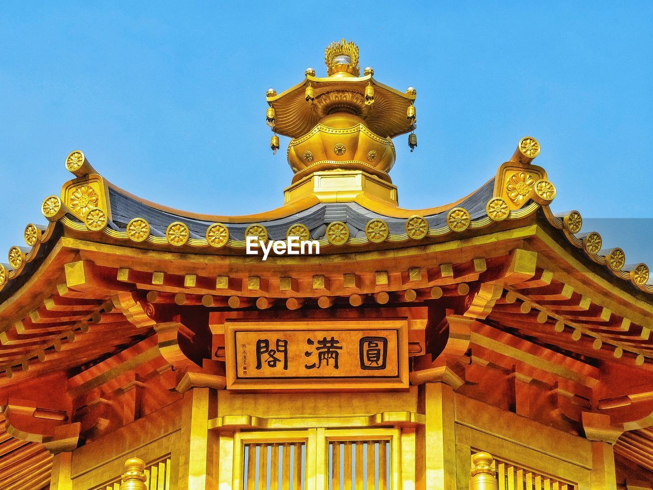 LOW ANGLE VIEW OF TEMPLE AGAINST SKY