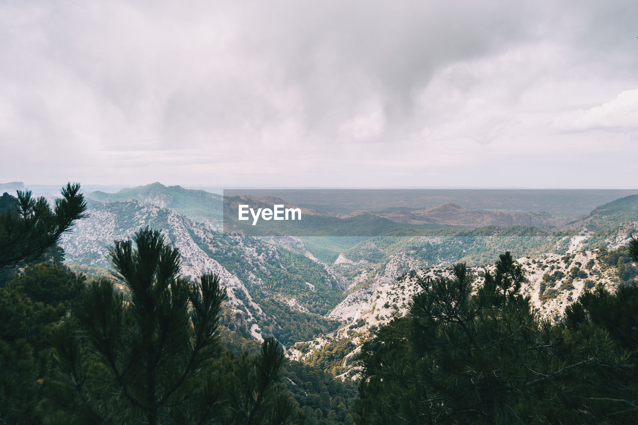 Panoramic view of landscape and mountains against sky