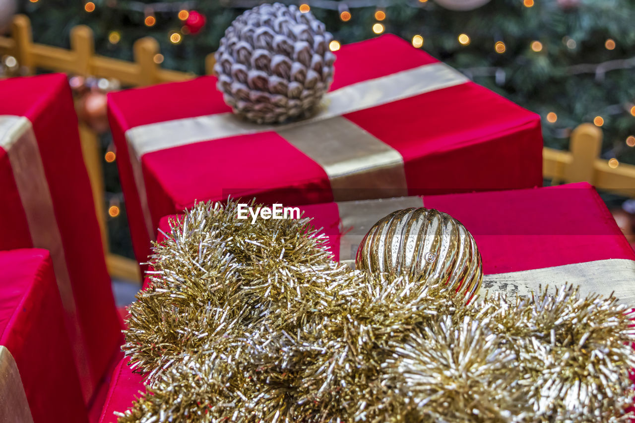 Close-up of christmas decorations on gift box