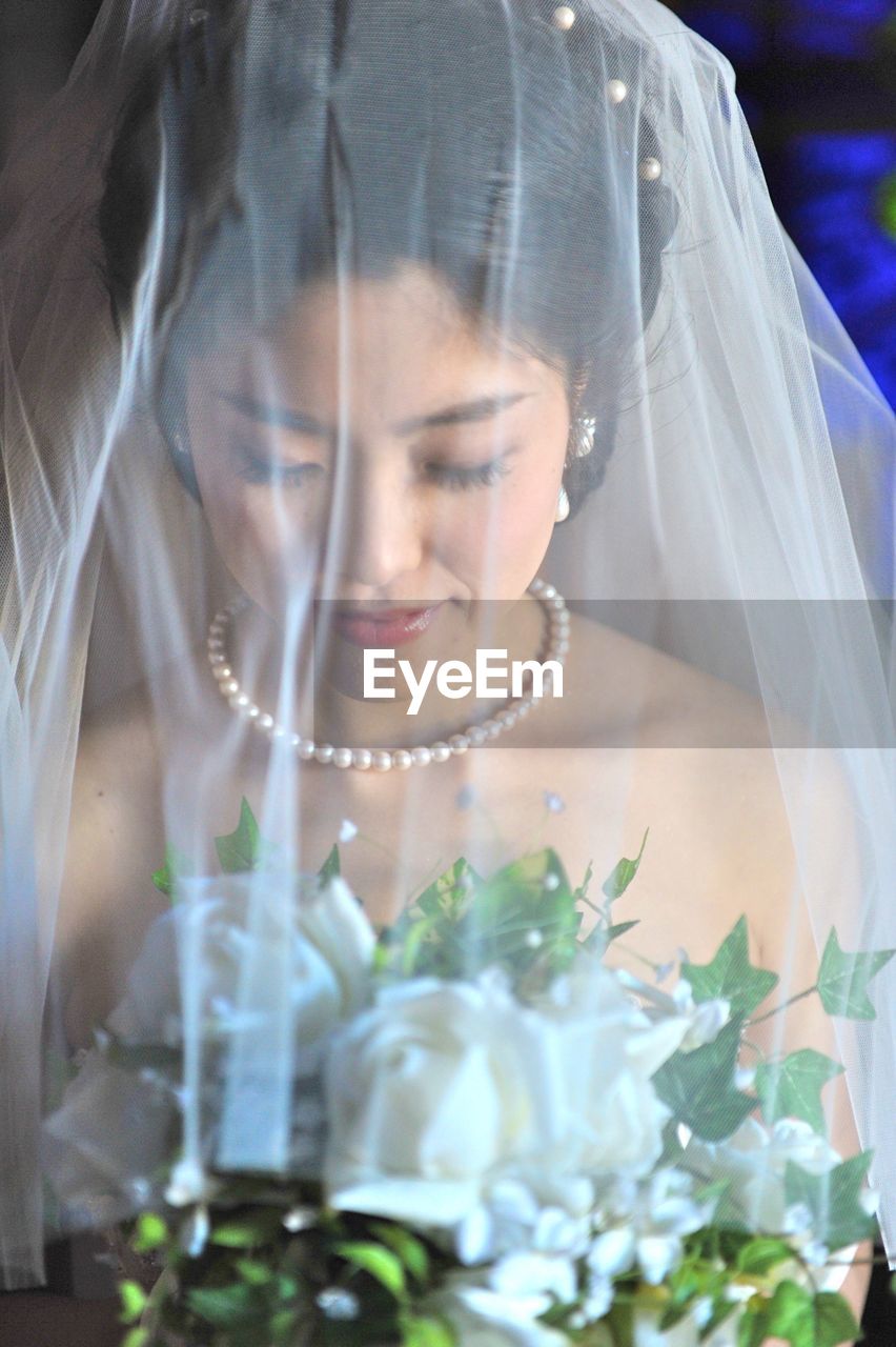 CLOSE-UP OF YOUNG WOMAN WITH EYES