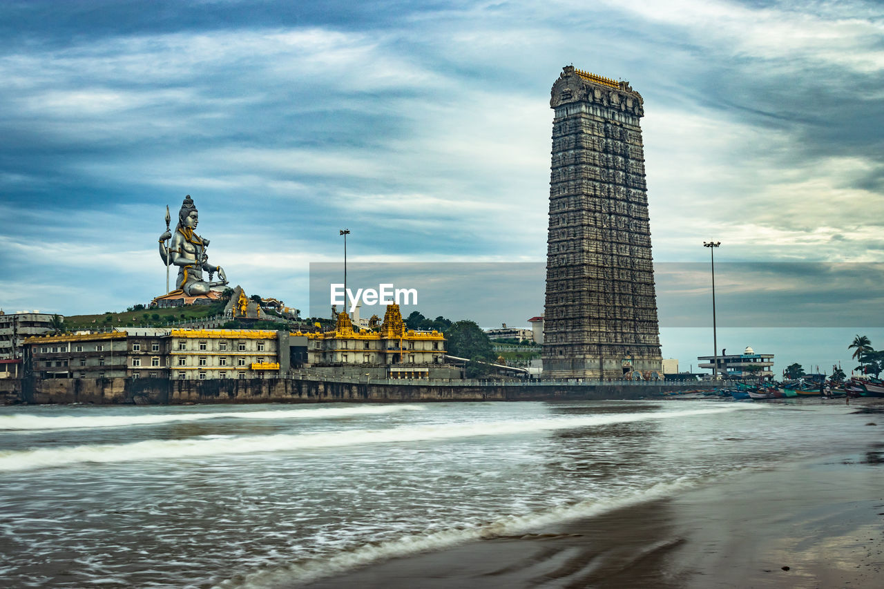 Murdeshwar temple early morning view from low angle with sea waves