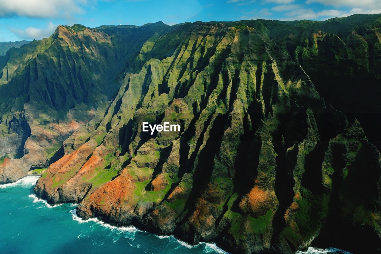 SCENIC VIEW OF ROCK FORMATION AGAINST SKY