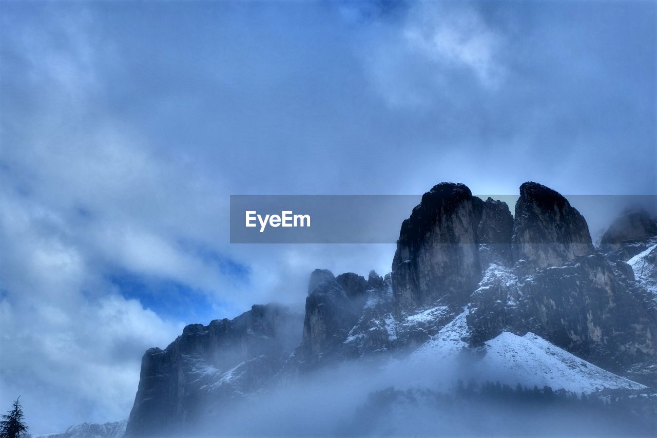 LOW ANGLE VIEW OF MOUNTAIN AGAINST SKY