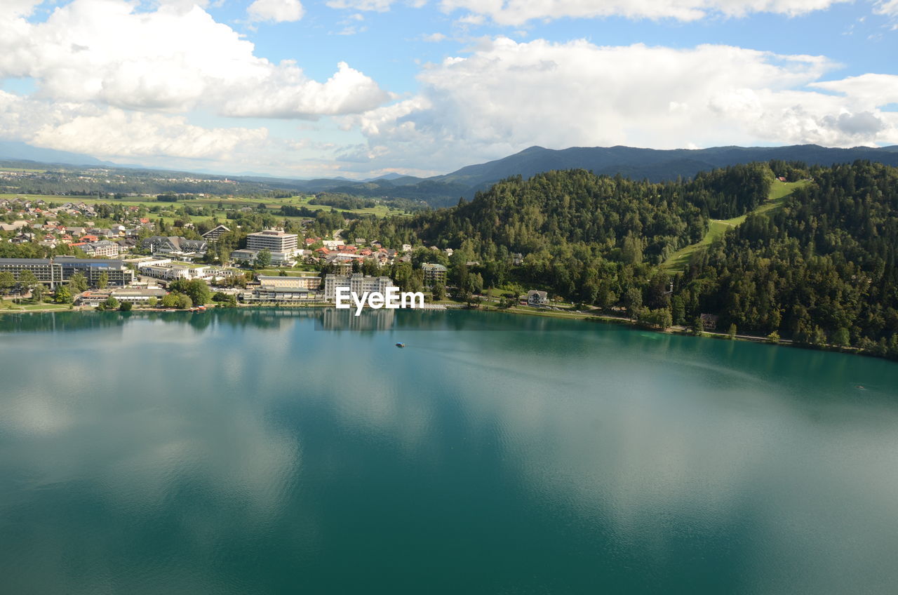 SCENIC VIEW OF LAKE AGAINST MOUNTAINS