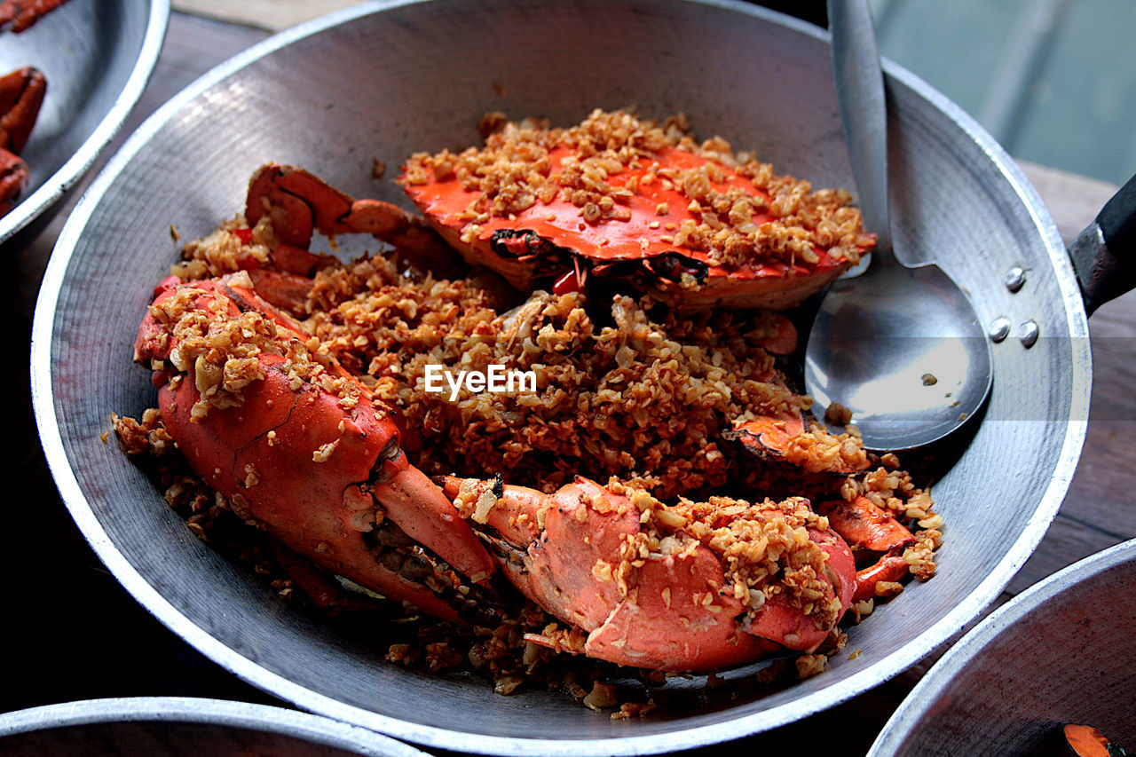 High angle view of mud crab  in cooking pan