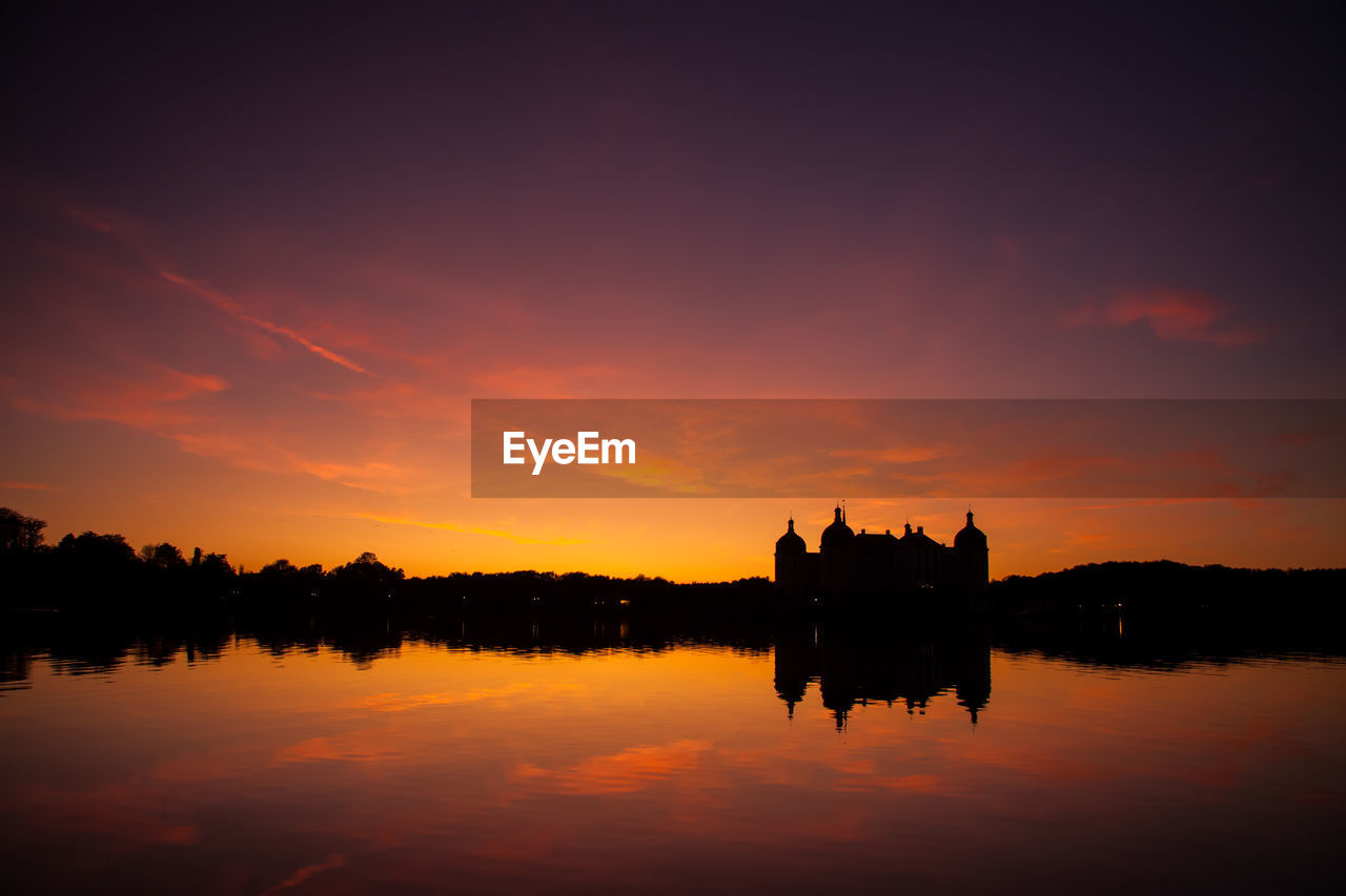 SCENIC VIEW OF LAKE AGAINST ROMANTIC SKY