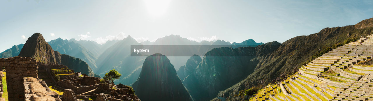 Panoramic view of rocky mountains against sky