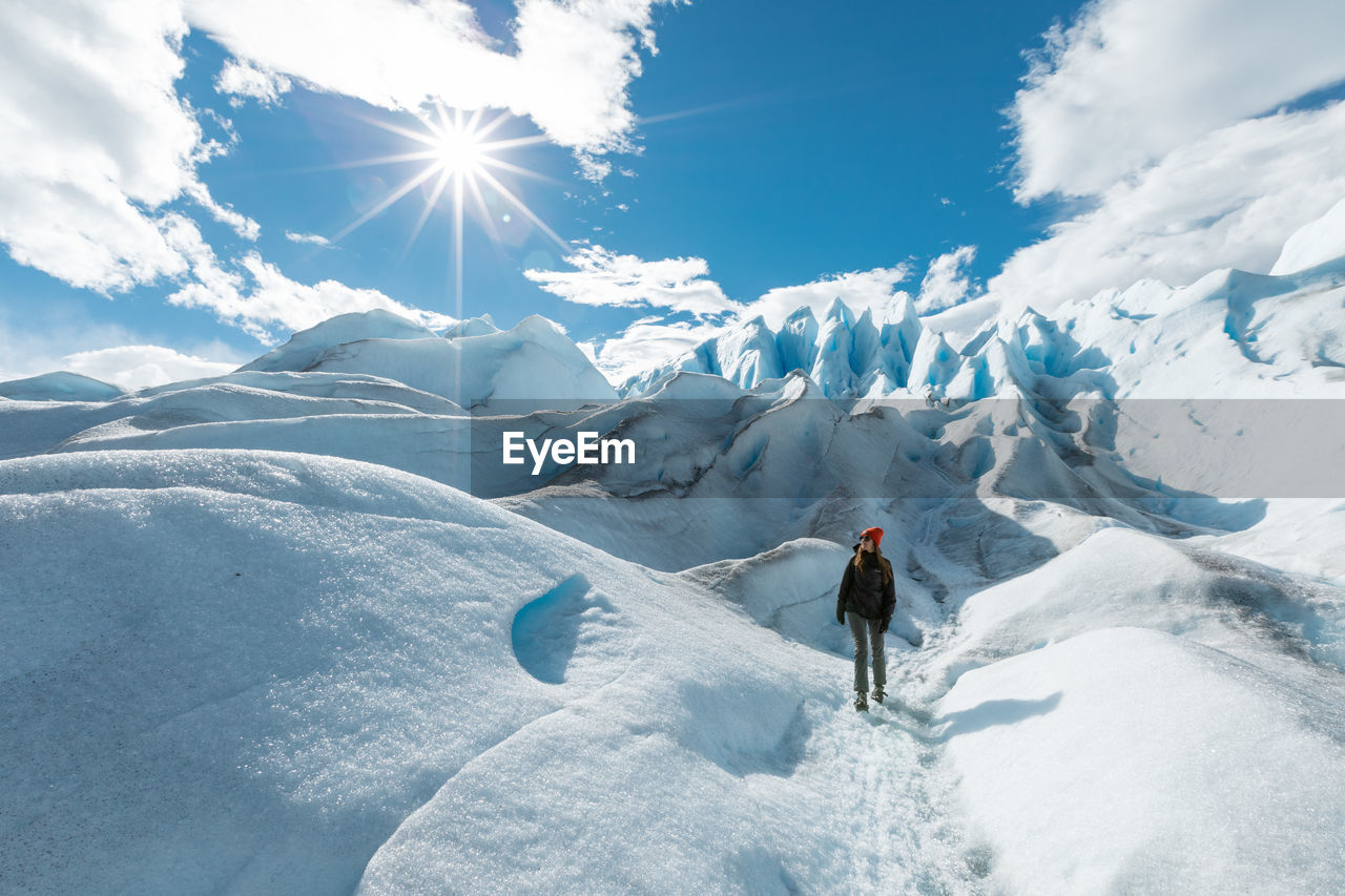 SCENIC VIEW OF SNOW COVERED MOUNTAINS AGAINST SKY