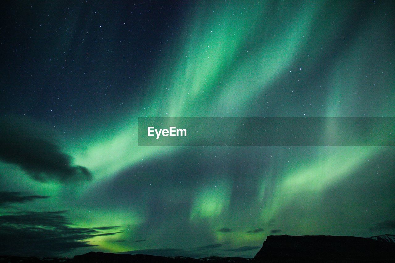 LOW ANGLE VIEW OF SKY AT NIGHT DURING WINTER
