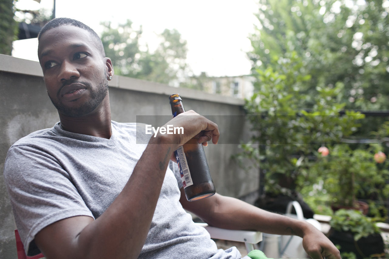 Young man enjoying a beer