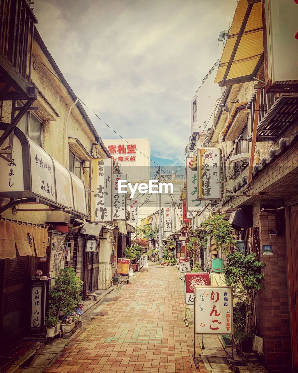 STREET AMIDST BUILDINGS IN TOWN