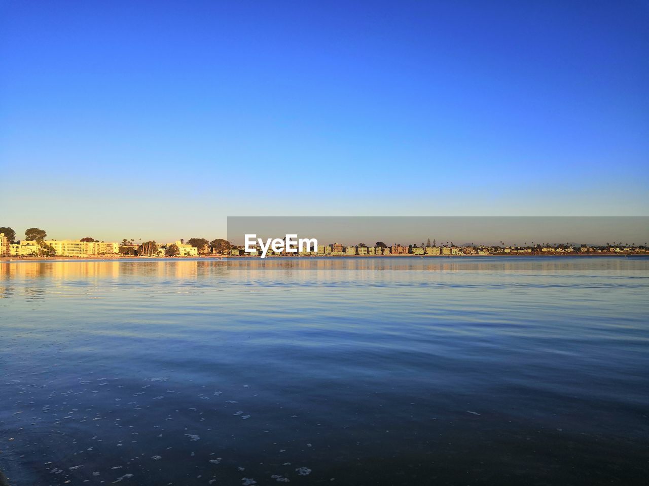 SCENIC VIEW OF SEA AGAINST BLUE SKY