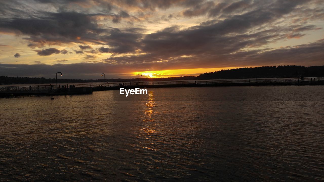 View of calm sea at sunset