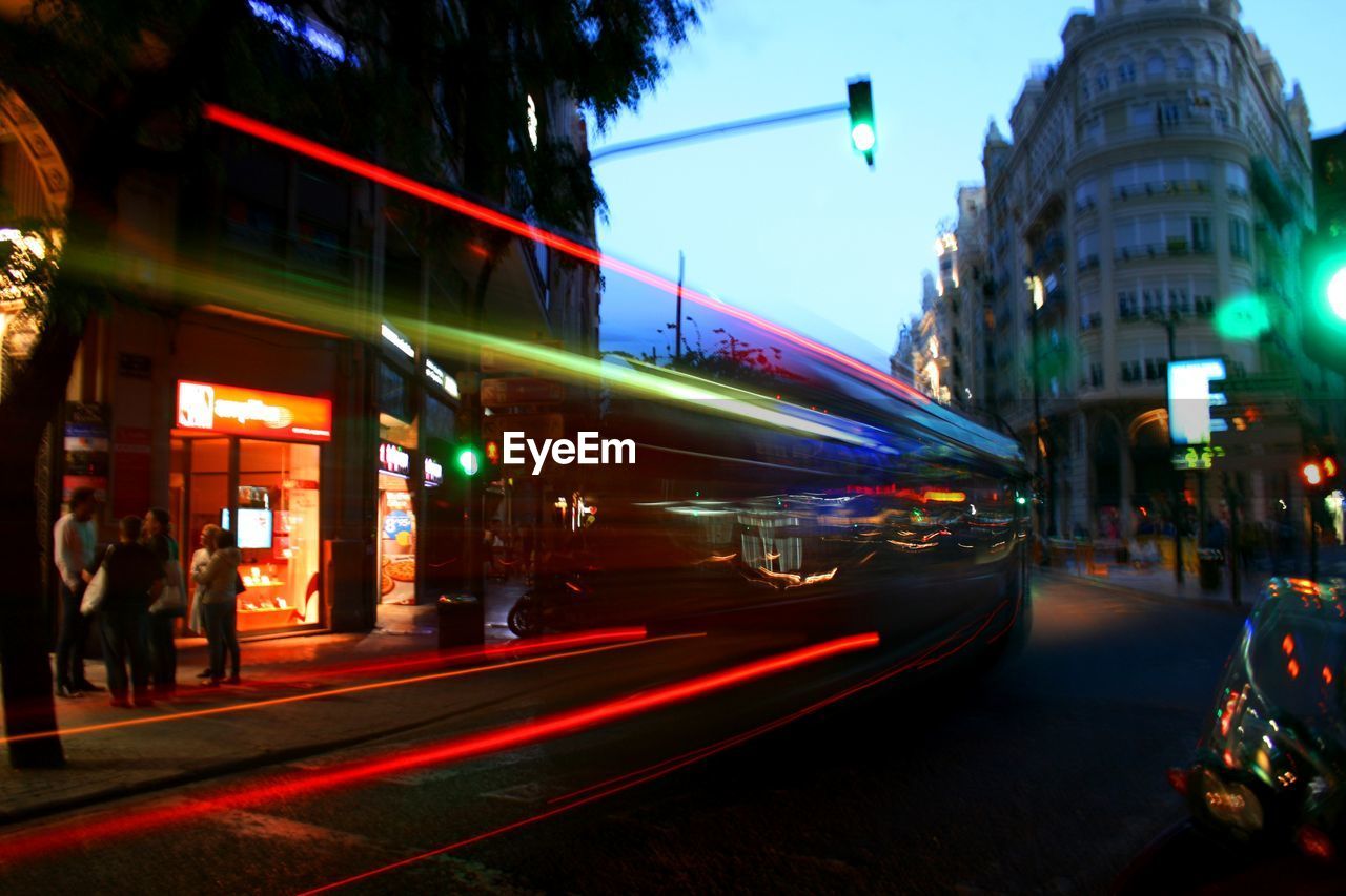 TRAFFIC ON CITY STREET AT NIGHT