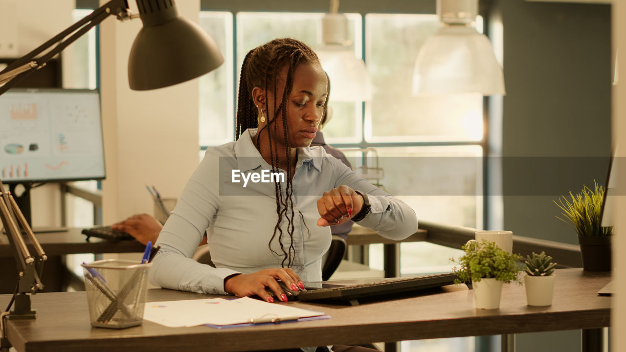 portrait of young businesswoman working at desk