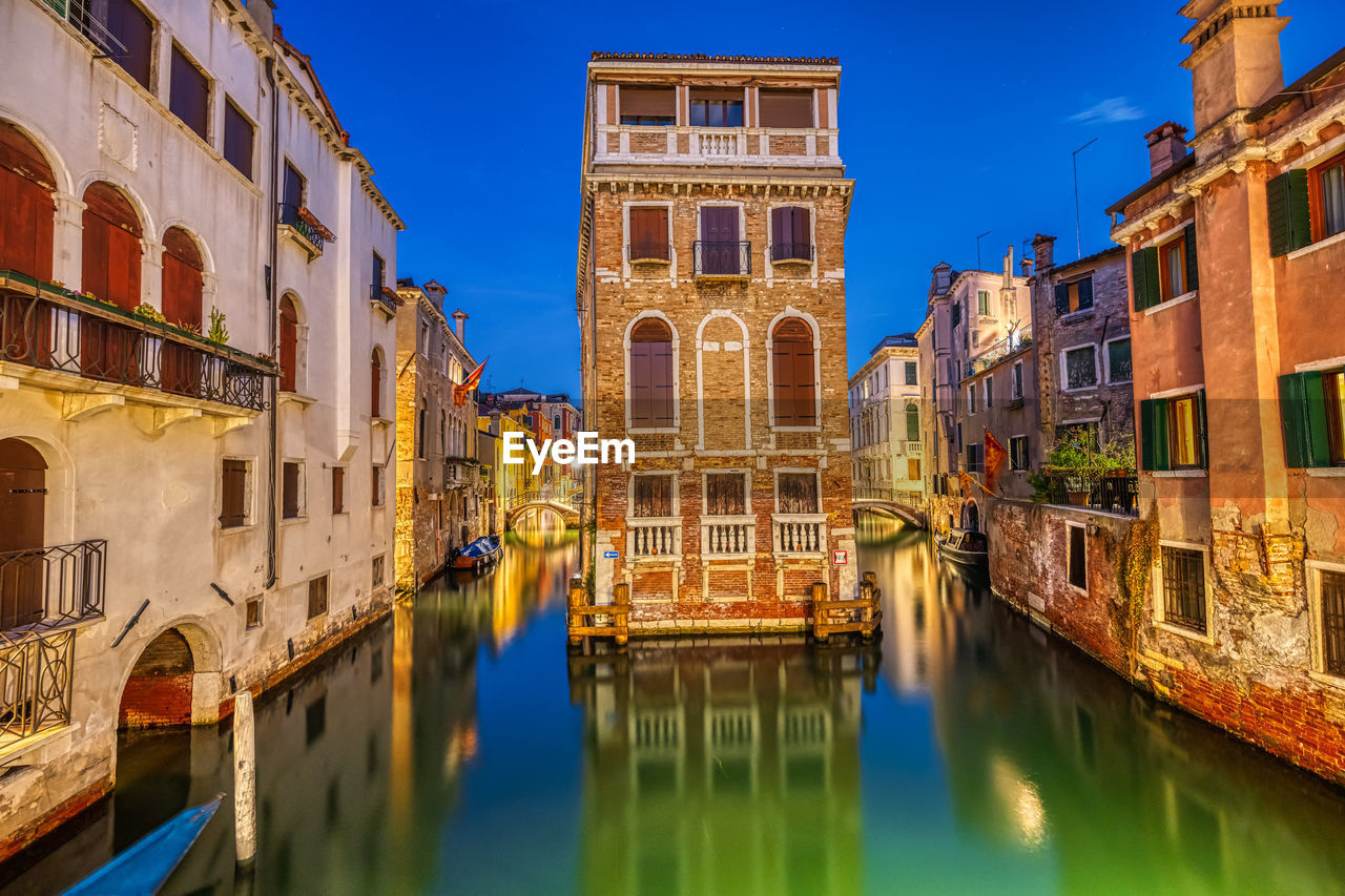 Small channel in venice, italy, at night