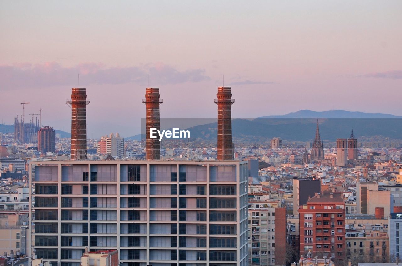 High angle view of cityscape against sky during sunset