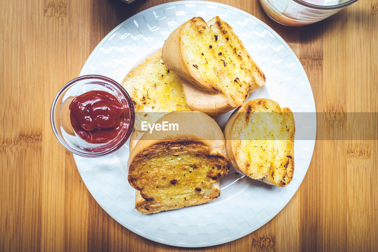 CLOSE-UP OF BREAKFAST SERVED ON TABLE