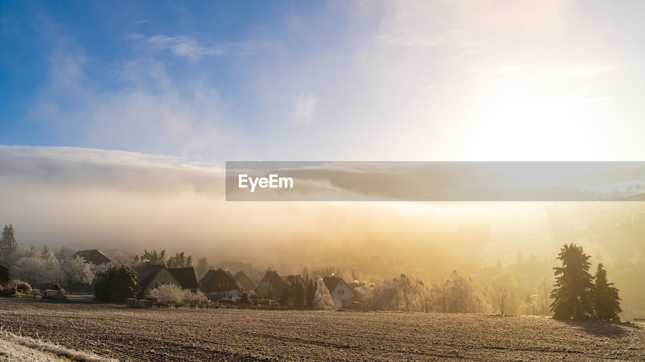 Foggy view - seiffen in winter saxony germany ore mountains.