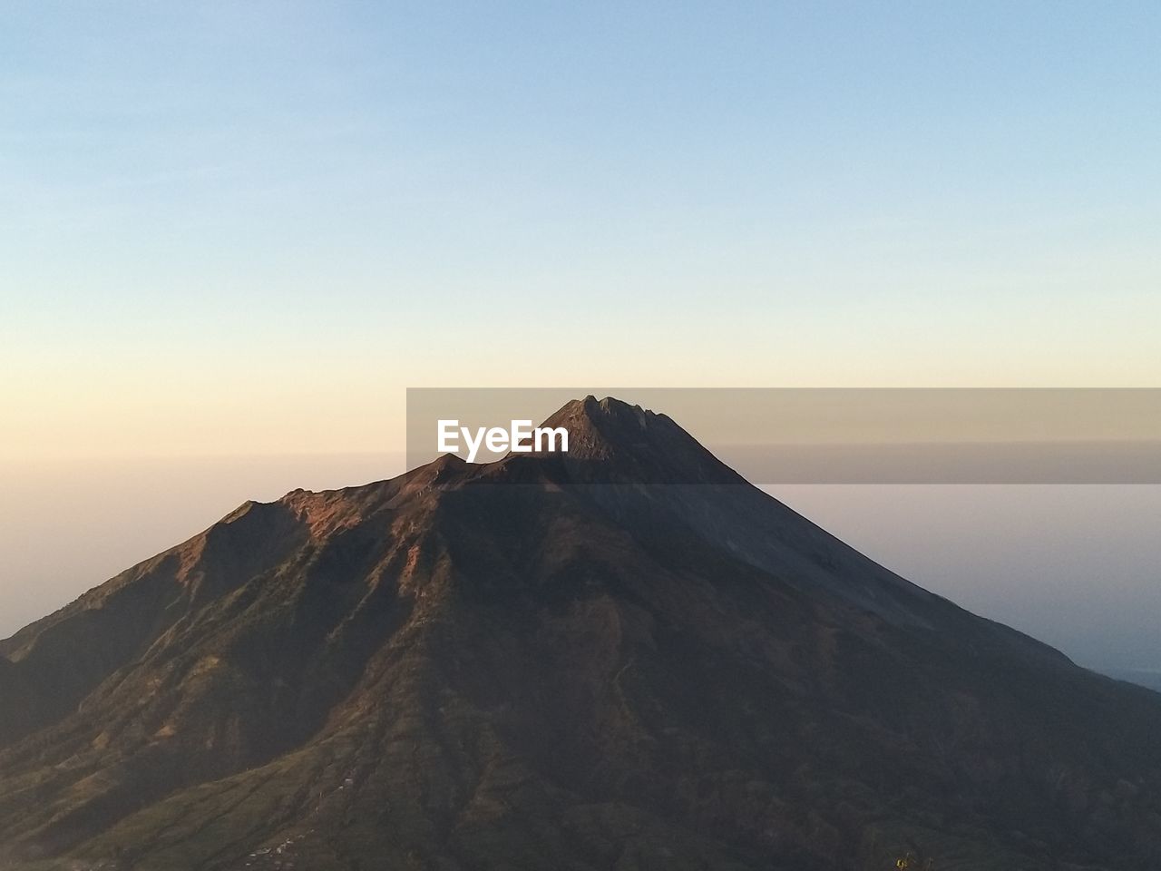 Scenic view of mountains against clear sky