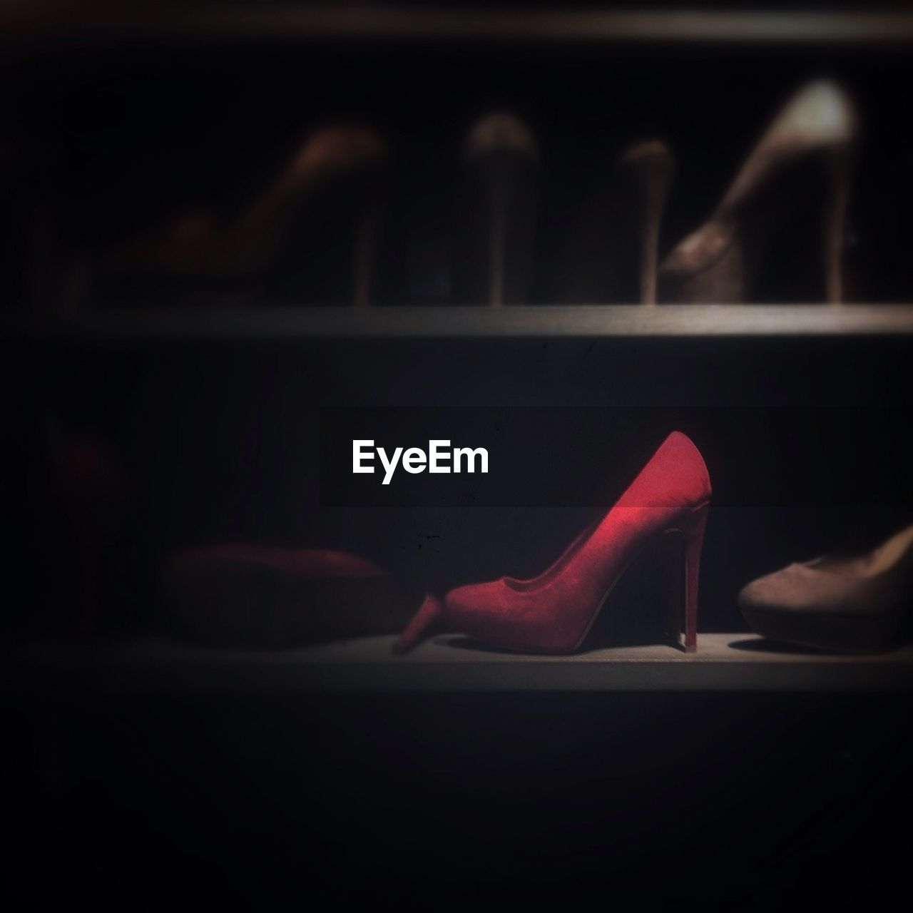 Close-up of high heels on rack