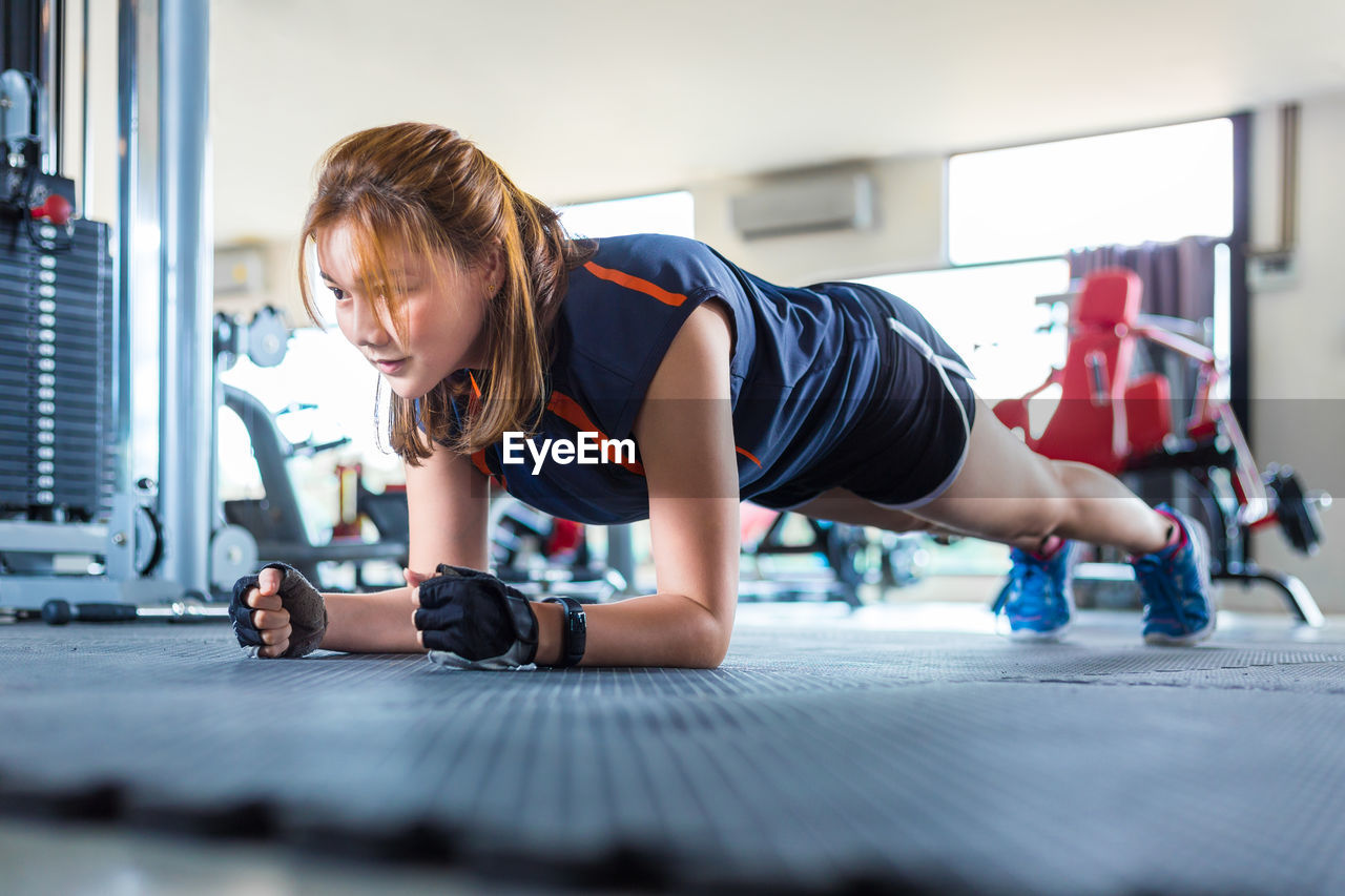 Woman exercising in gym