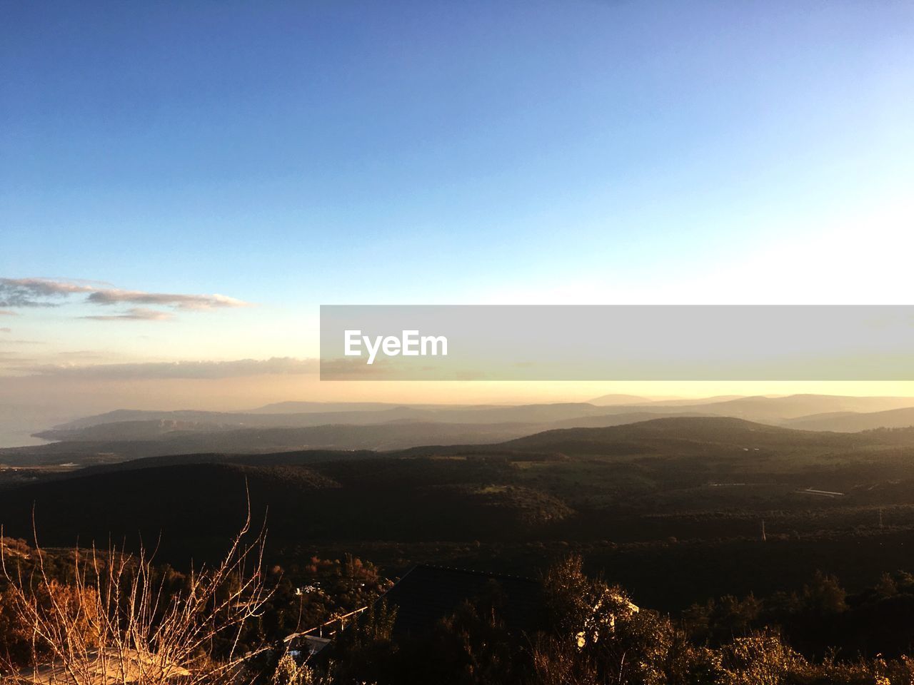 SCENIC VIEW OF LANDSCAPE AGAINST SKY DURING SUNSET