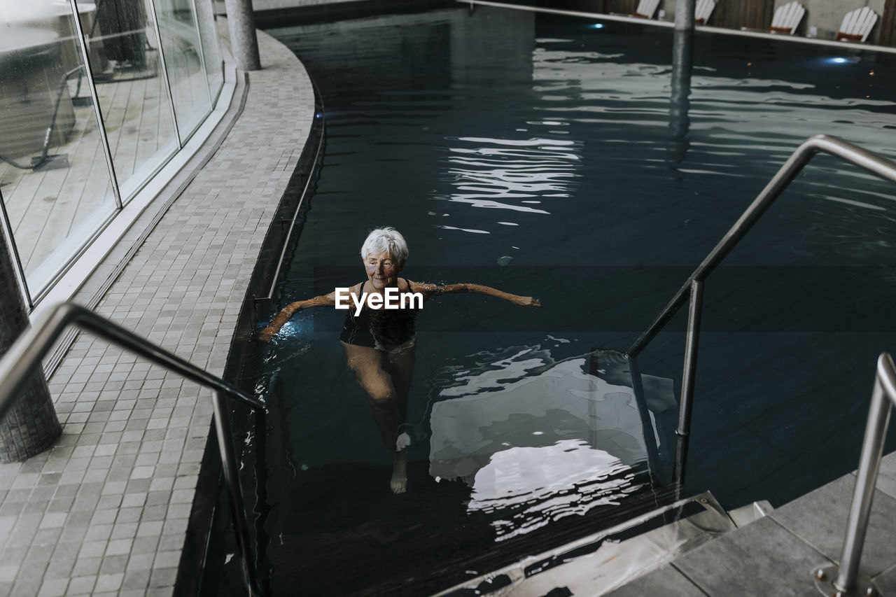 Senior woman in spa swimming-pool