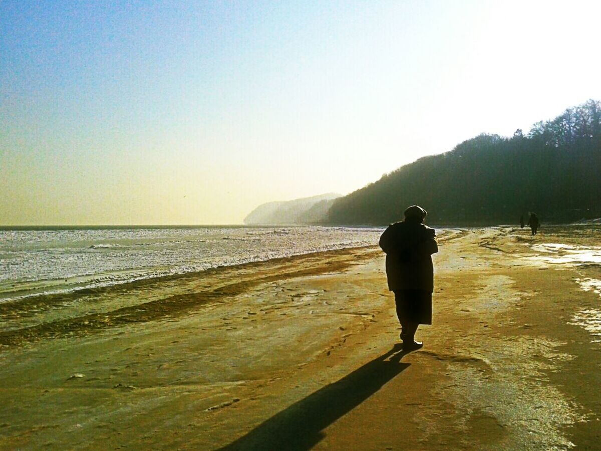 Man walking on beach