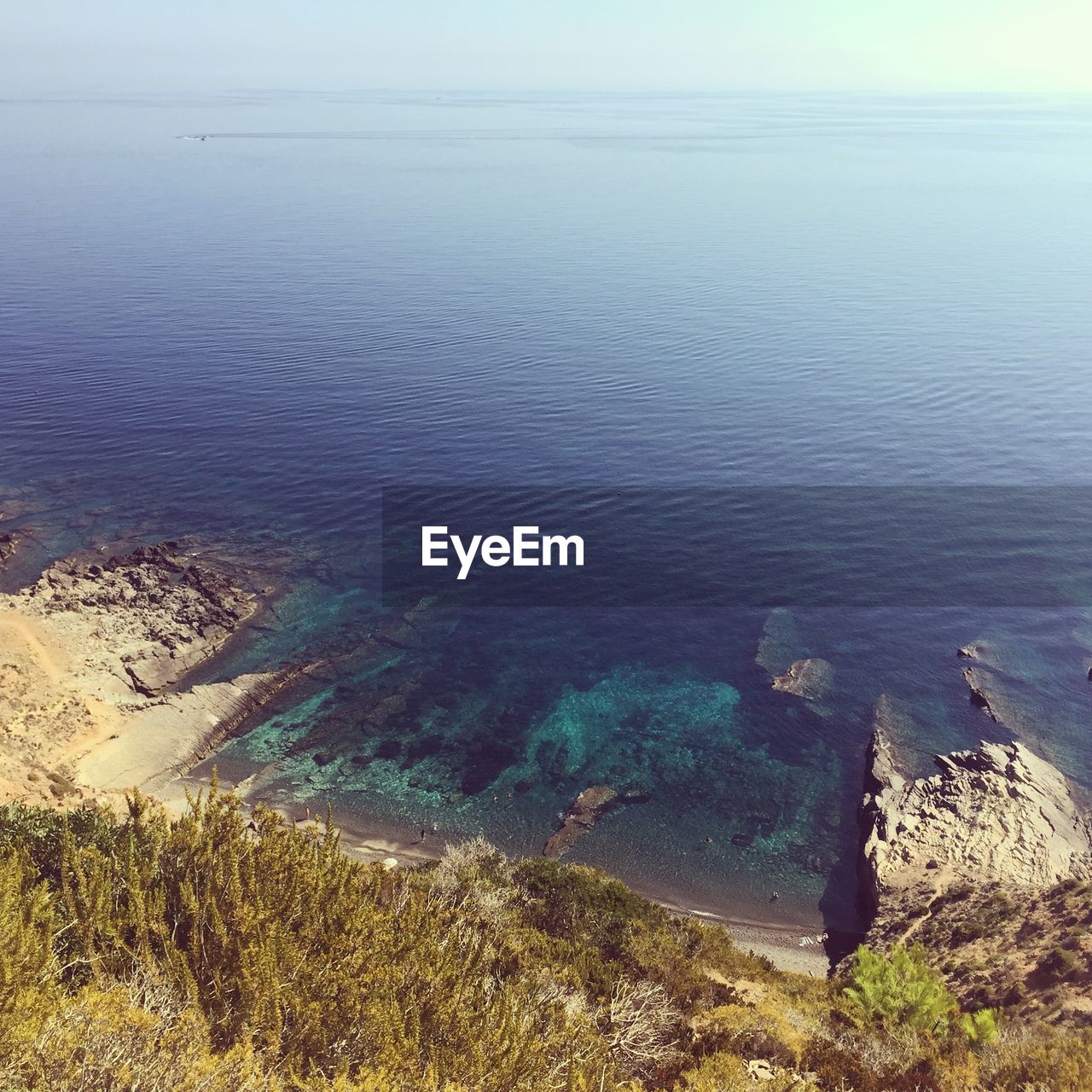 HIGH ANGLE VIEW OF SEA SHORE