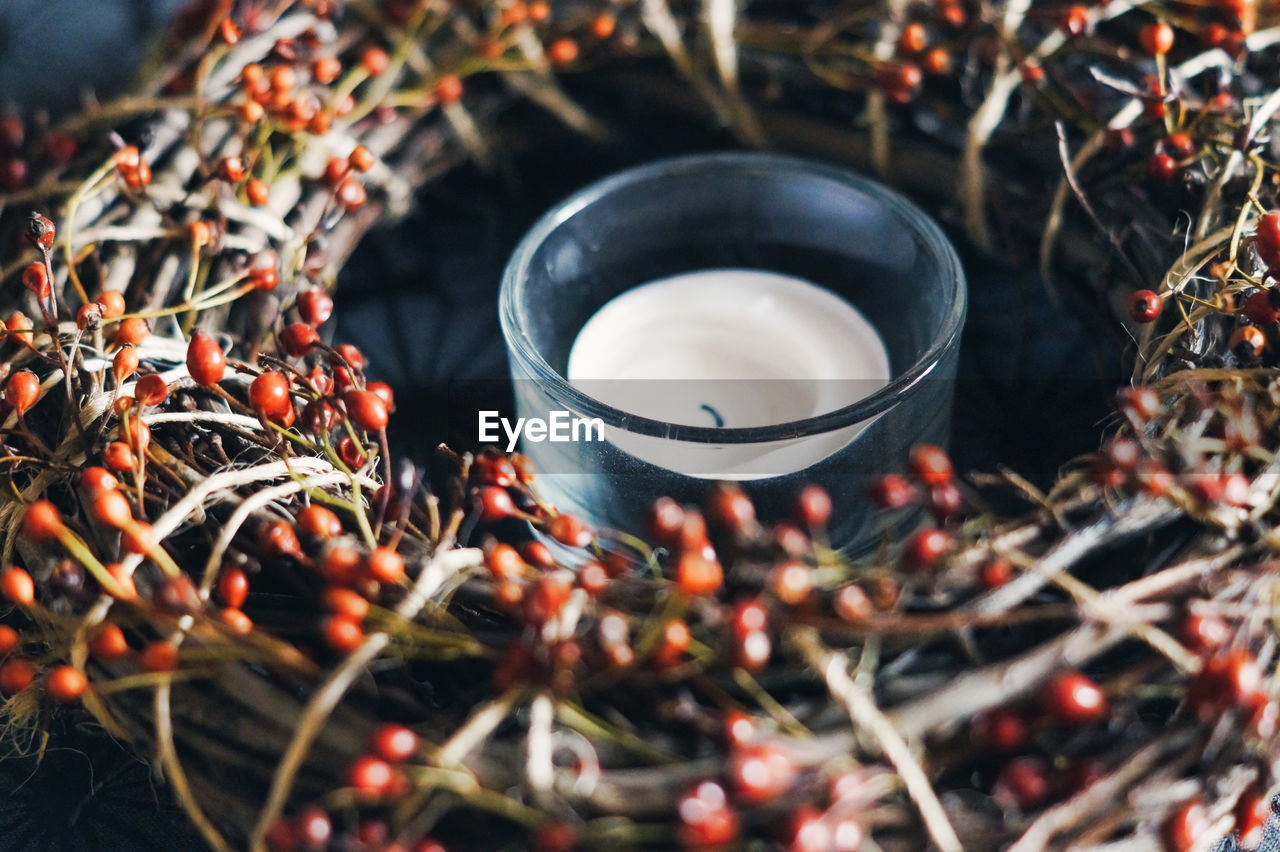 High angle view of candle in nest