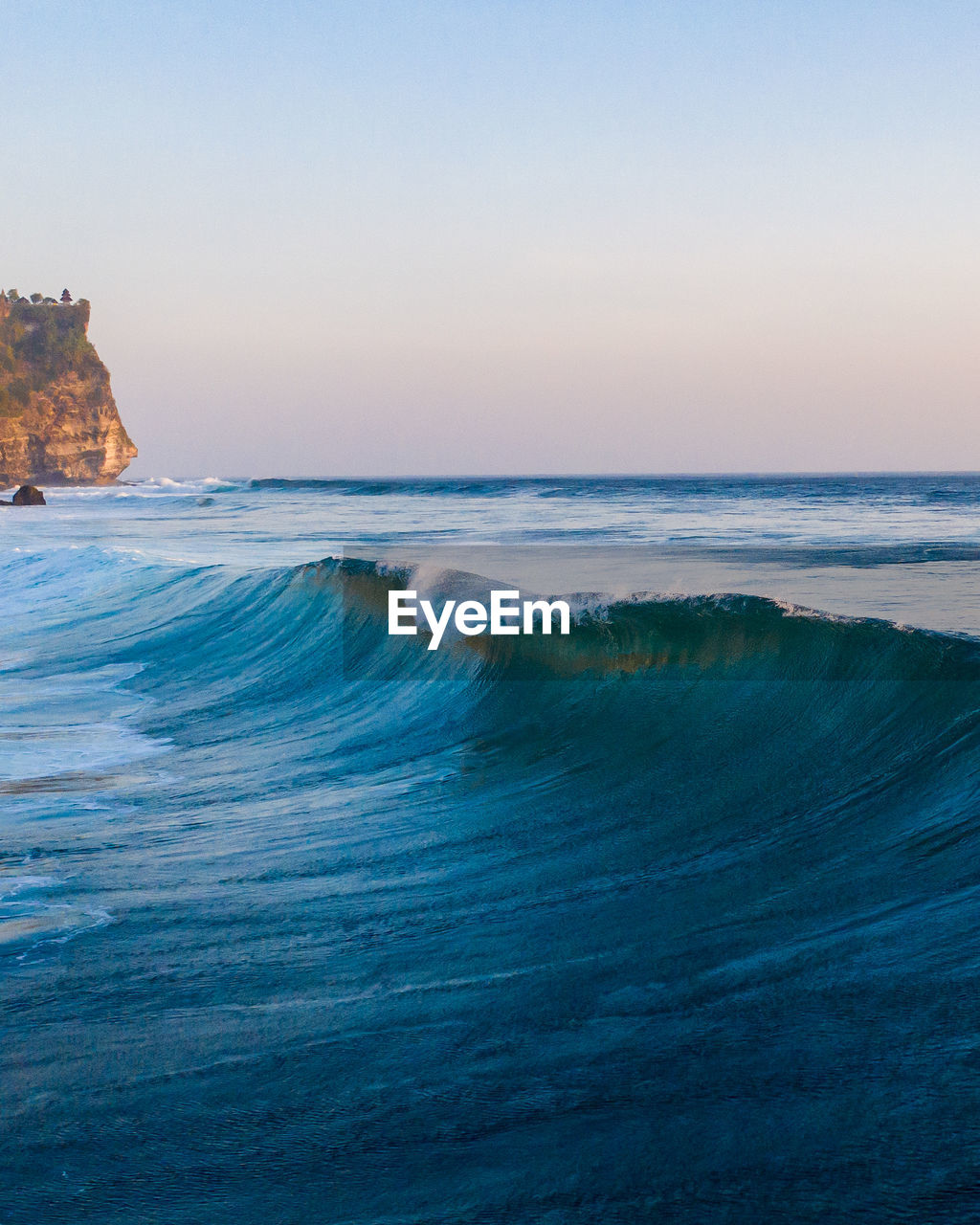 Beautiful wave curling in the big surf of bali, indonesia