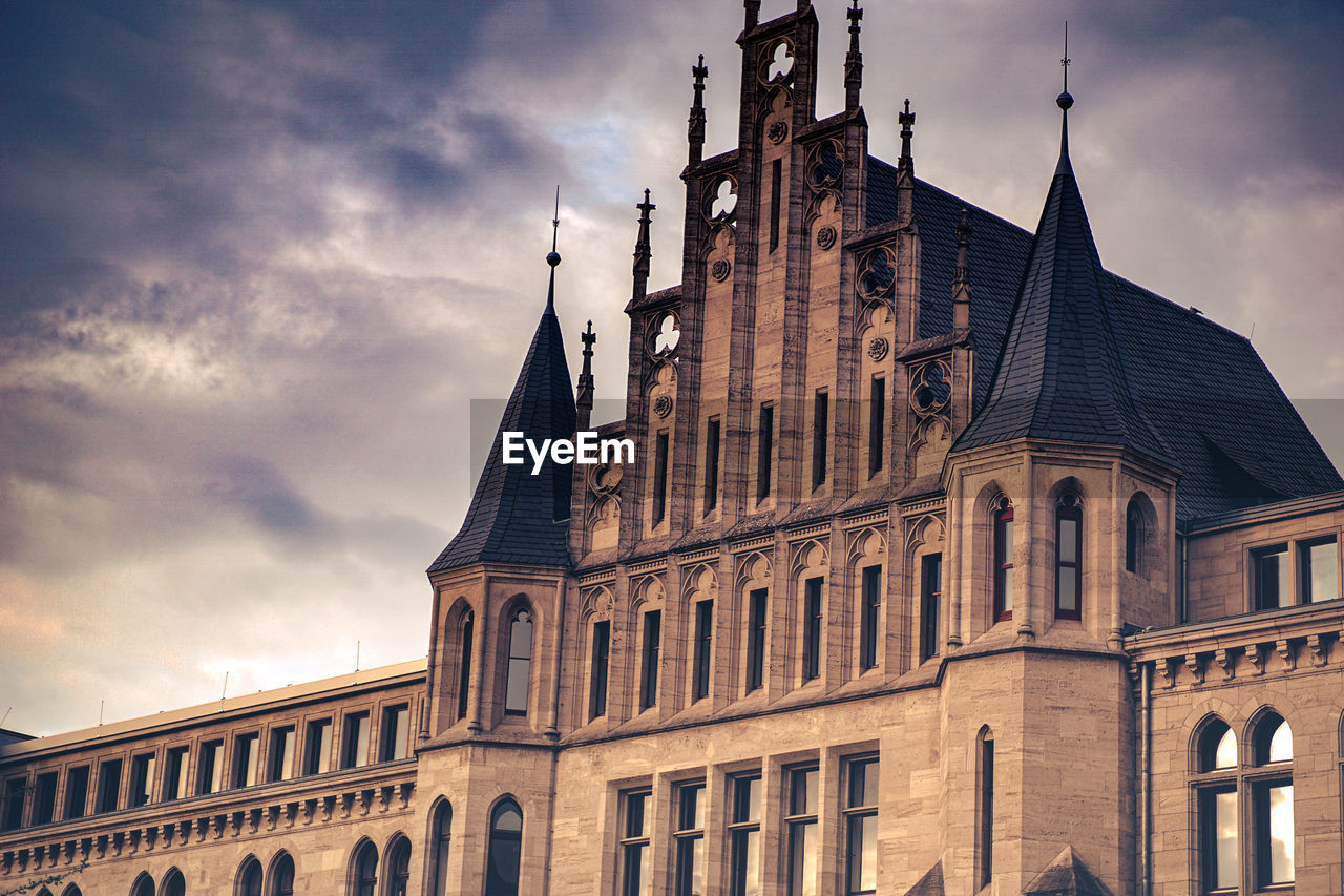 Low angle view of historic building against sky