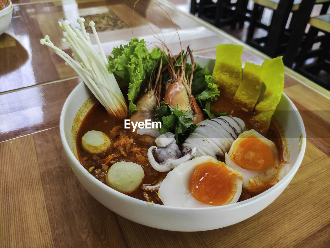 food and drink, food, healthy eating, wellbeing, meal, table, freshness, vegetable, bowl, asian food, dish, indoors, cuisine, japanese food, no people, high angle view, lunch, egg, culture, soup, restaurant, plate, serving size, close-up, wood, meat, still life