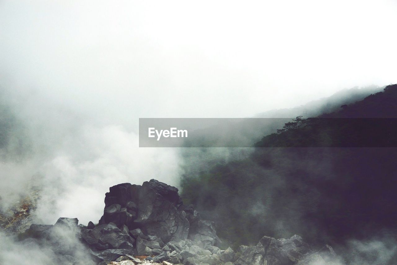 Rocks on mountains in foggy weather