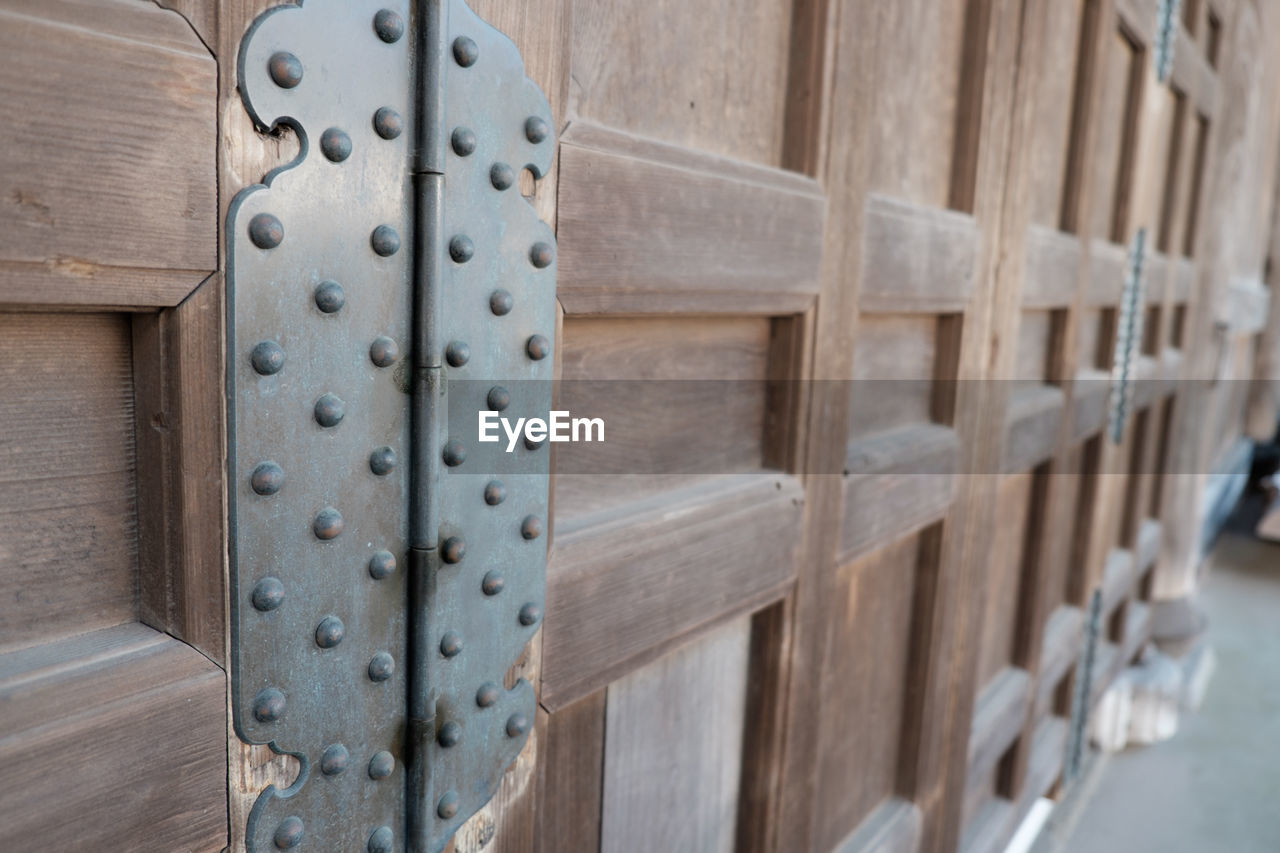 Close-up of closed old-fashioned wooden door